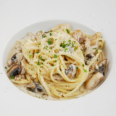 Паста с курицей и грибами в Kitchen по цене 430