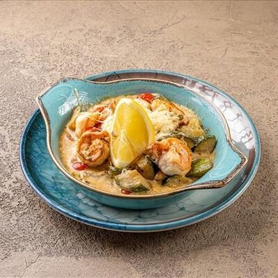 Рапаны в сливочном соусе запеченные с овощами в У рыбака по цене 1300 ₽