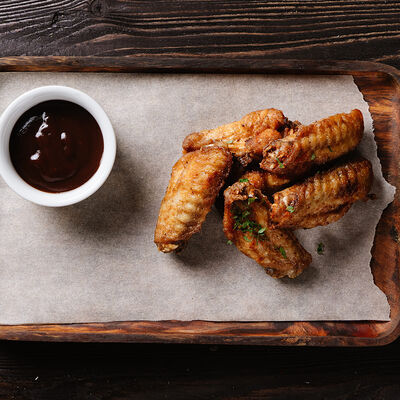 Куриные крылышки в Smoke house по цене 360 ₽