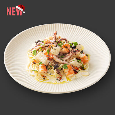 Спагетти с морепродуктами в сливочно-икорном соусе в Secret Kitchen по цене 850 ₽