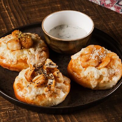 Хачапури по-мегрельски с морепродуктами в TATEV по цене 1200 ₽