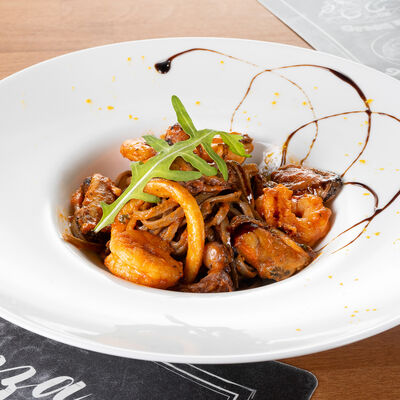 Паста Феттуччине с креветками в томатном соусе в РичБро по цене 820 ₽