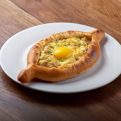 Хачапури лодочка с курицей в Кафе хачапури по цене 540 ₽