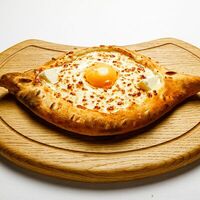 Хачапури по-аджарскив Grand Кафе Натахтари