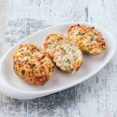 Запеченный картофель с начинкой в Изюм по цене 250 ₽