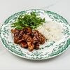 Рис с кусочками курицы в кисло-сладком соусе в Date по цене 990