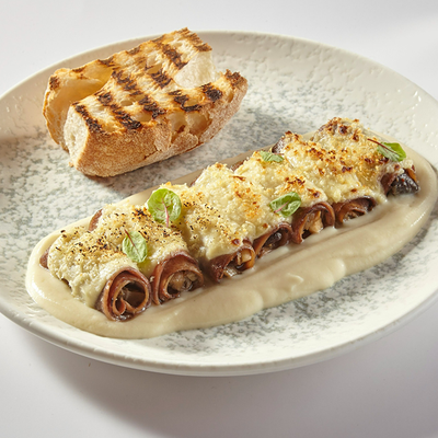 Рулетики из говяжьего языка с грибным персиладом в Слоёнка по цене 710 ₽