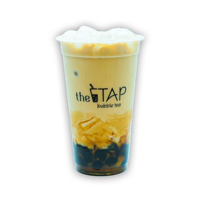 Молочный чай с манго и карамельной тапиокой в The TAP Bubble Tea по цене 480 ₽