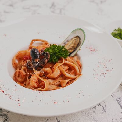 Феттучини с морепродуктами в Сакура по цене 380 ₽
