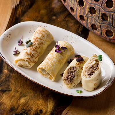 Блины с мясом в SULUGUNI по цене 742 ₽