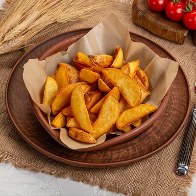 Картофель по-деревенски в Русская кухня по цене 230 ₽