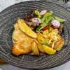 Куриный шницель с картофелем по-деревенски в Kumpan по цене 530