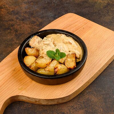 Чкмерули с картофелем в Кинза по цене 605 ₽