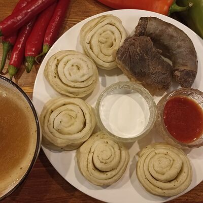 Даргинский хинкал с сушеным мясом и сушеной колбасой в Адыгская кухня по цене 990 ₽