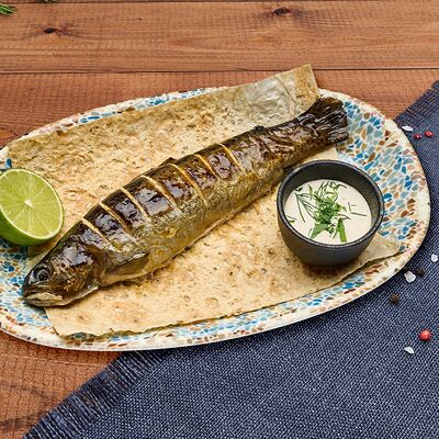 Форель запеченная с лаймом и соусом цахтон в Деда хинкали по цене 1320 ₽