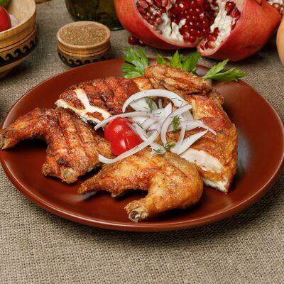 Цыпленок на углях в Шашлычный дворик по цене 720 ₽