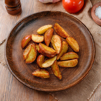 Картофель по-деревенски в Берлога по цене 270 ₽