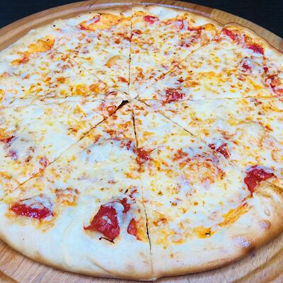 Пицца Сырная в Wasabl по цене 720 ₽