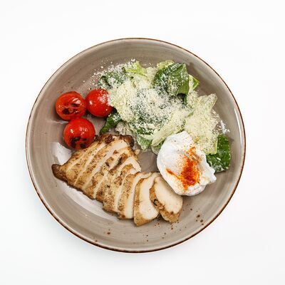 Салат Цезарь с яйцом пашот и добавками в White Fox Cafe по цене 715 ₽