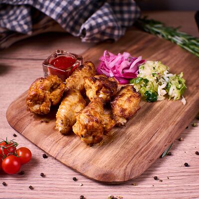 Куриные крылья в Grill mix по цене 570 ₽