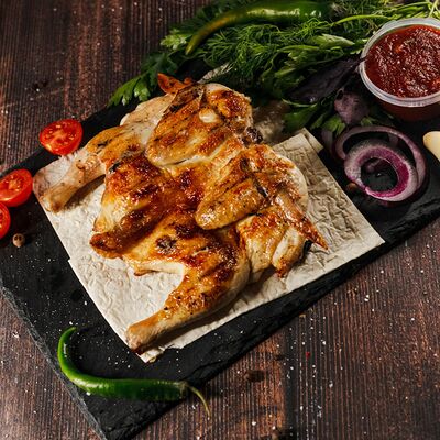 Цыплёнок на мангалев Шафран мясо&хаус по цене 450 ₽