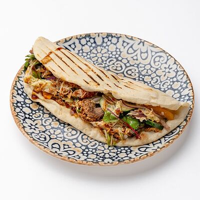 Донер с рваной свининойв Осетинские пироги от Бирюзы по цене 550 ₽