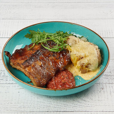 Ребра свиные в медово-горчичном соусе с печеным картофелем в АндерСон по цене 990 ₽