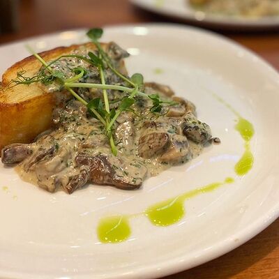 Картофельный гратен с лесными грибами в Ранчо Grill & Bar по цене 670 ₽