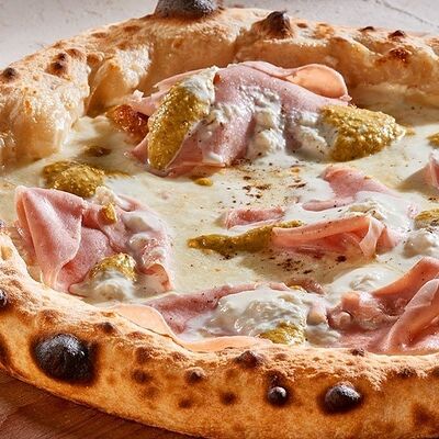 Пицца с фаршированным бортом с мортаделлой и фисташкой в Pizzarella36 по цене 1290 ₽