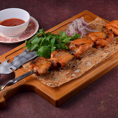 Шашлык из куриных бедрышек в Чичилаки по цене 720 ₽