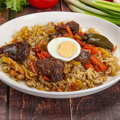 Плов из говядиныв Пекарня Донер Шаурма по цене 460 ₽