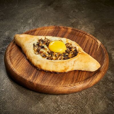 Хачапури по-аджарски с грибами в Гранат по цене 560 ₽