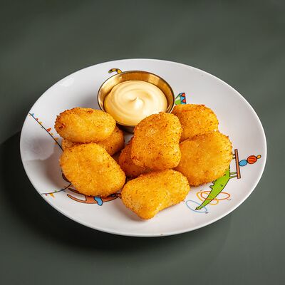 Наггетсы с сырным соусомв Green Pub по цене 483 ₽