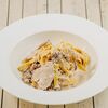 Паста фетучини с курицей и грибами в Перчини на огне по цене 470