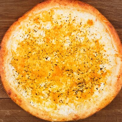 Четыре сыра (31 см) в Pizzadonia по цене 540 ₽