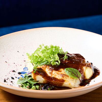 Цоцхали из палтуса с лимонным пюре, солодом и наршарабом в NANA Pirveli по цене 1440 ₽