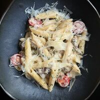 Пенне с говядиной, белыми грибами и трюфельным соусом в Адрес 39