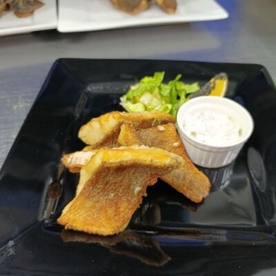 Брюшки окуня во фритюре с соусом Тартар в Карасёвня по цене 444 ₽