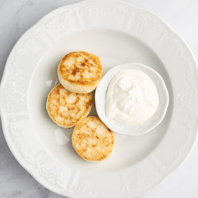 Сырники со сметаной в Патис по цене 403 ₽