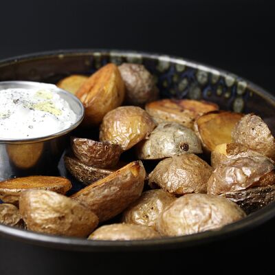 Запеченный бейби-картофель в Hidden по цене 245 ₽