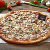 Деревенская в PIZZA Zilla американская и римская по цене 1200