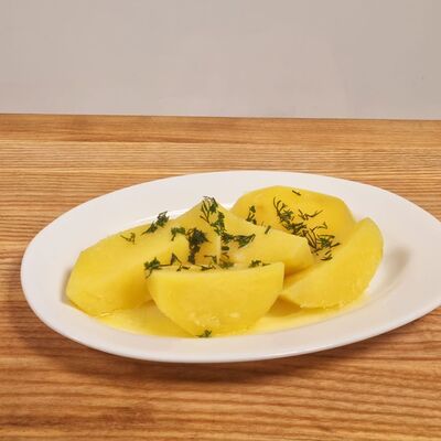 Отварной картофель, политый сливочным маслом в Золотая вилка по цене 210 ₽
