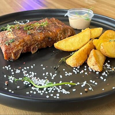 Свиные ребрышки с картофелем по-деревенски в Rigatoni по цене 499 ₽