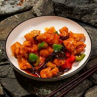 Мясо с ананасами в кисло-сладком соусе в Дунфан Во