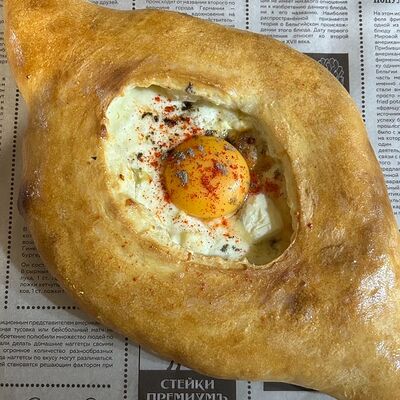 Хачапури по-аджарски в Горячо и вкусно по цене 650 ₽