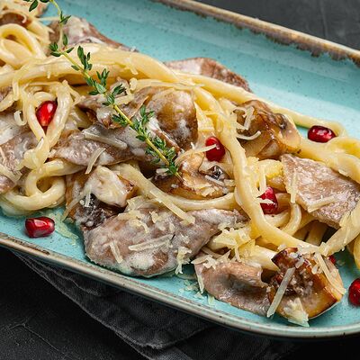 Лапша домашняя с языком и грибами в Гранат по цене 590
