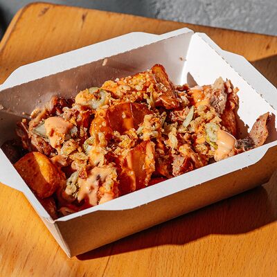 Картофель с реберным мясомв Butch Burger по цене 590 ₽