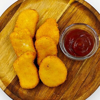 Наггетсы куриные в панировке в АБАРмот по цене 420 ₽