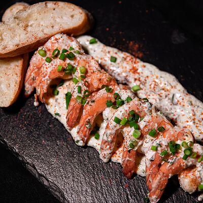 Креветки по-бургундски в Атлантида по цене 910 ₽