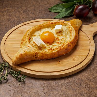 Хачапури По-аджарски в Оджахури по цене 770 ₽